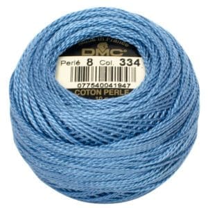 Tilda's Bon Voyage-Inspired thread boxfeaturing 8 DMC perle cotton  ballsno 8